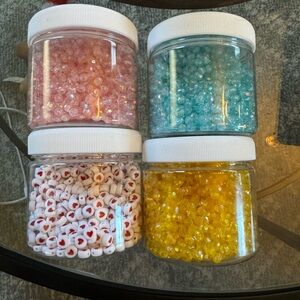 Set of Four colored craft Beads in Pink, Blue, White, and Yellow